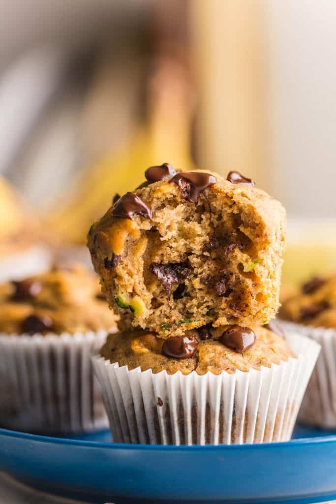 a Banana Zucchini Muffin on top of another with a bite taken out