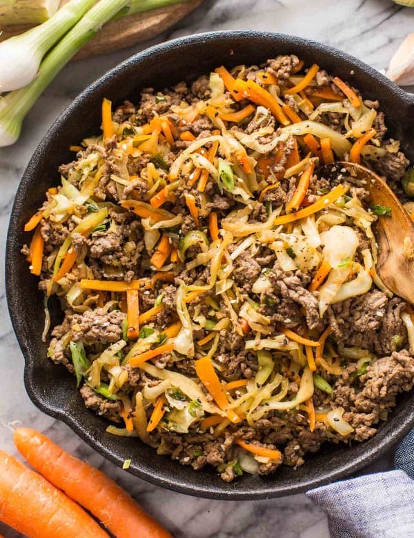 Beef & Cabbage Stir Fry in a cast iron skillet