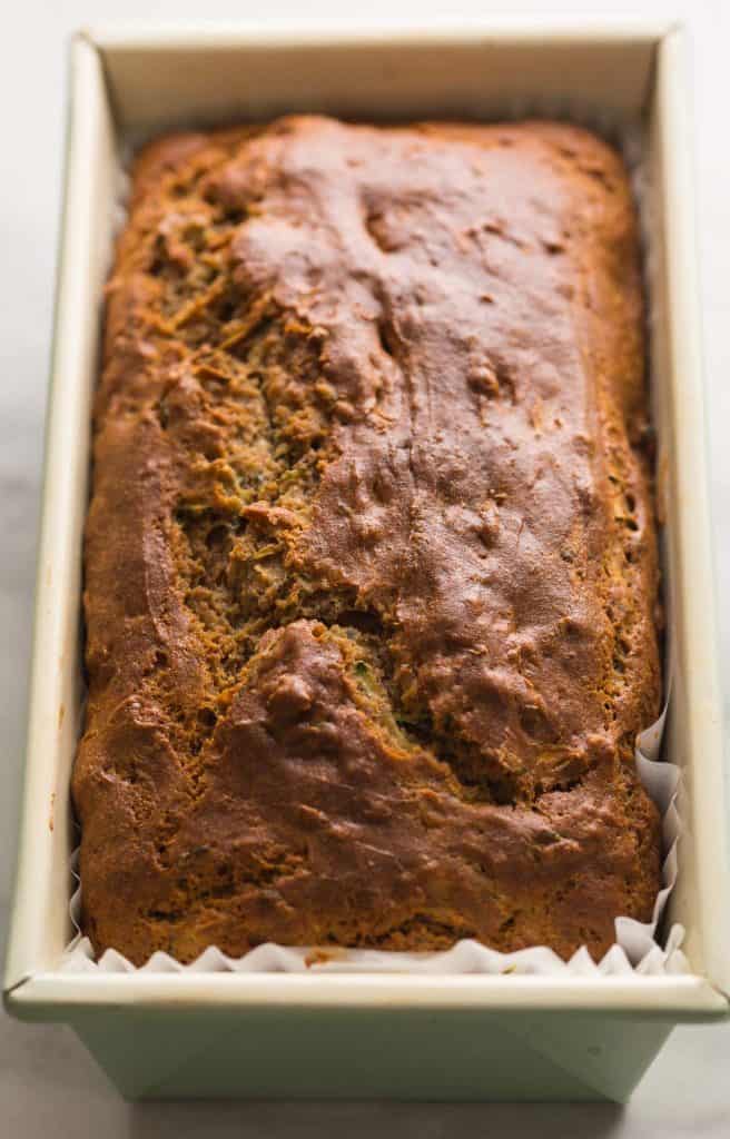 gluten free zucchini bread cooling in the loaf pan