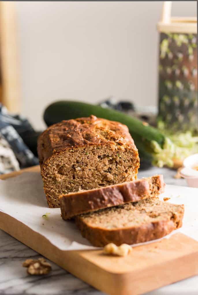 Gluten Free Zucchini Bread loaf on a cutting board