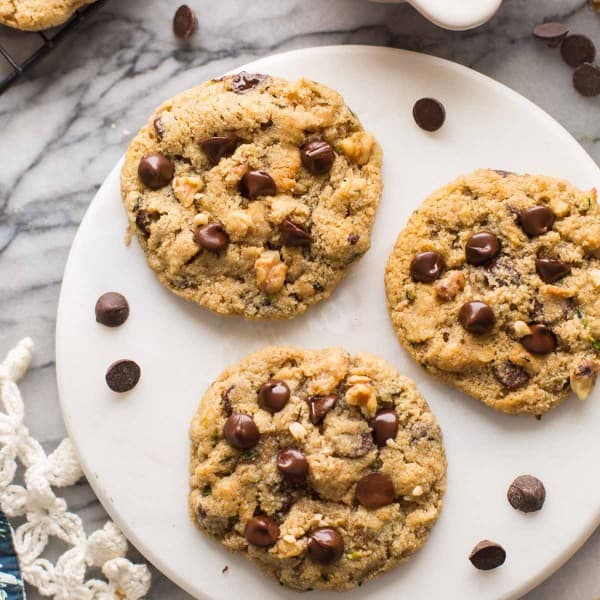 three almond flour zucchini cookies on a plate