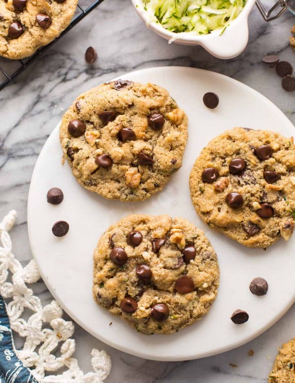 three almond flour zucchini cookies on a plate