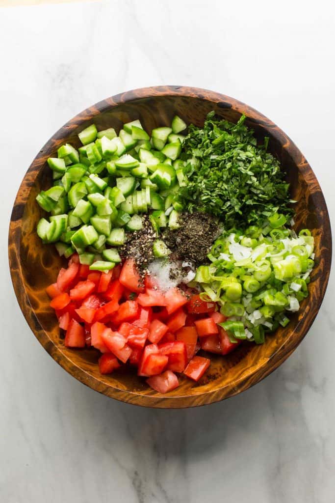 Shirazi Salad ingredients in a salad bowl