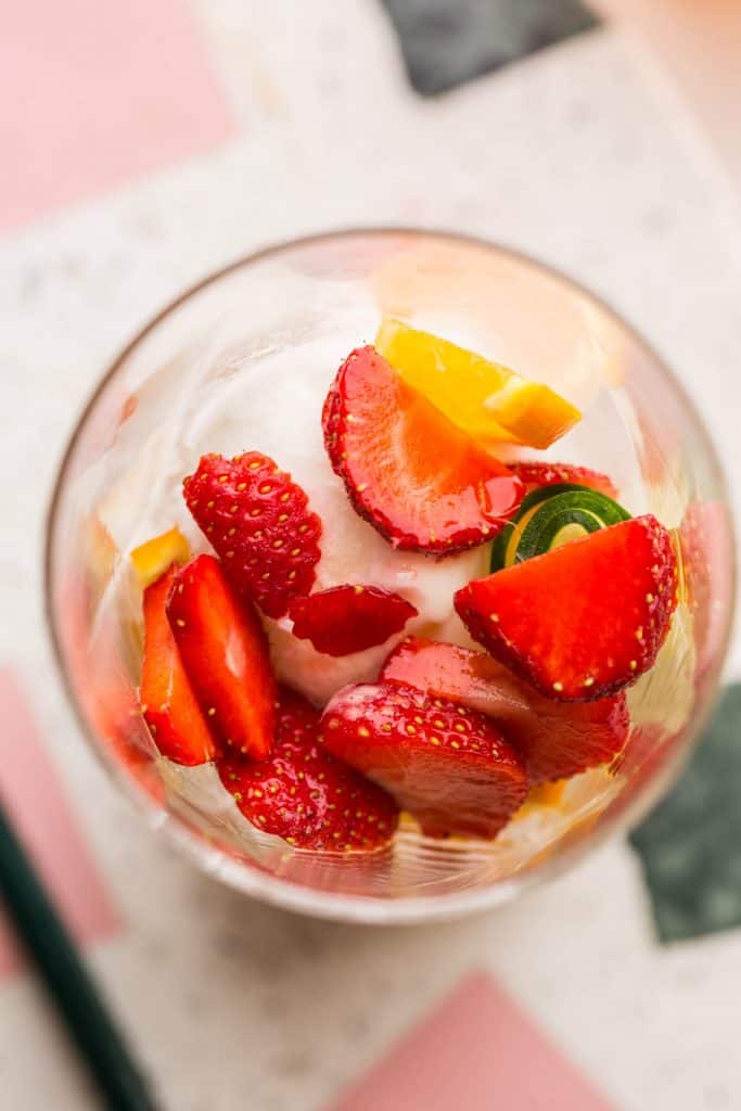 the inside of a pimm's cup float full of fruit before the lemonade gets added 