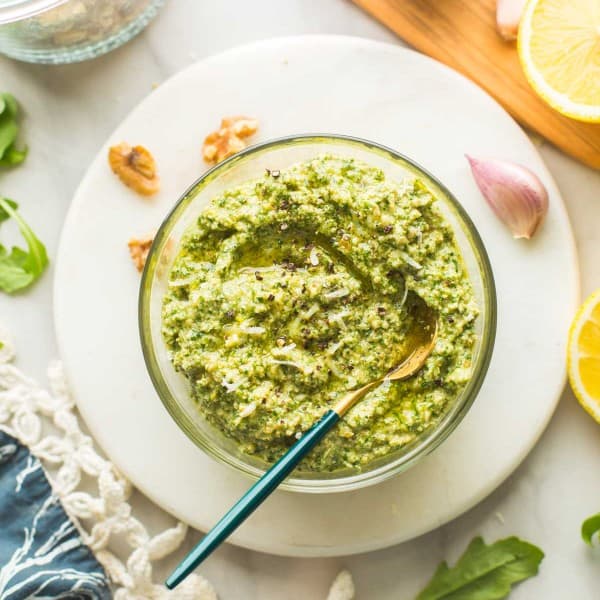 Rocket Pesto (Arugula Pesto) in a bowl with a spoon