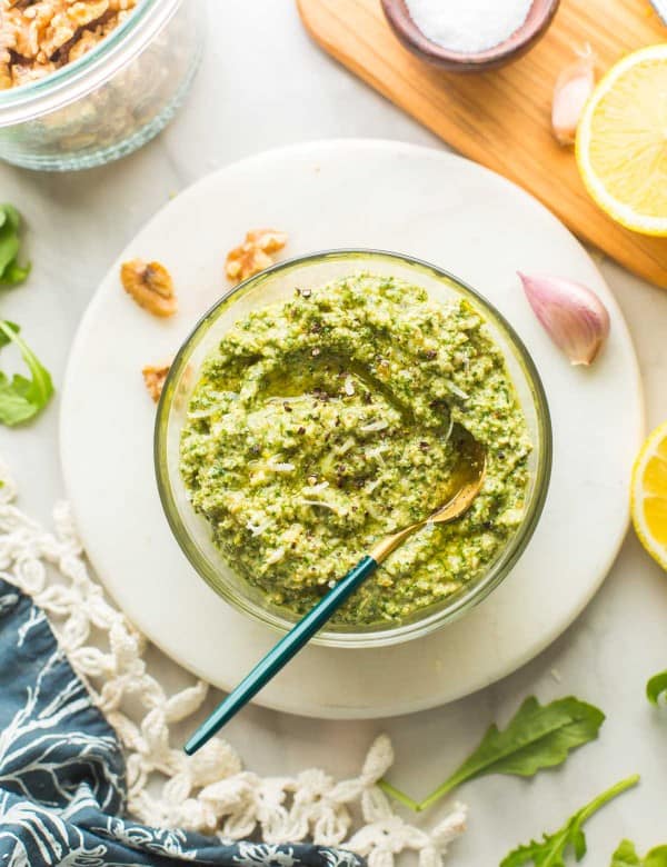 Rocket Pesto (Arugula Pesto) in a bowl with a spoon