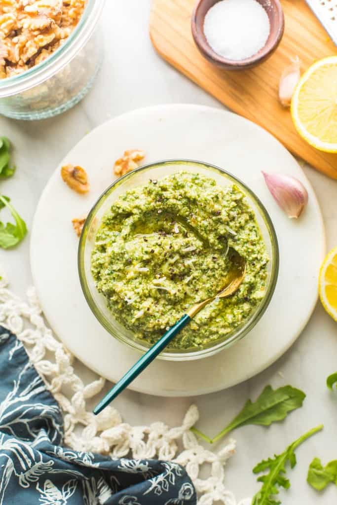 Rocket Pesto (Arugula Pesto) in a bowl with a spoon