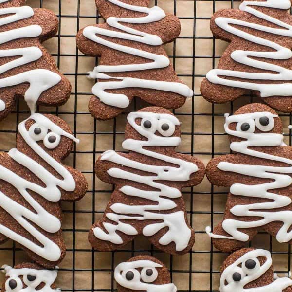 chocolate sugar cookies decorated like mummy gingerbread men