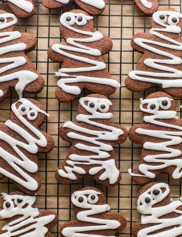 chocolate sugar cookies decorated like mummy gingerbread men