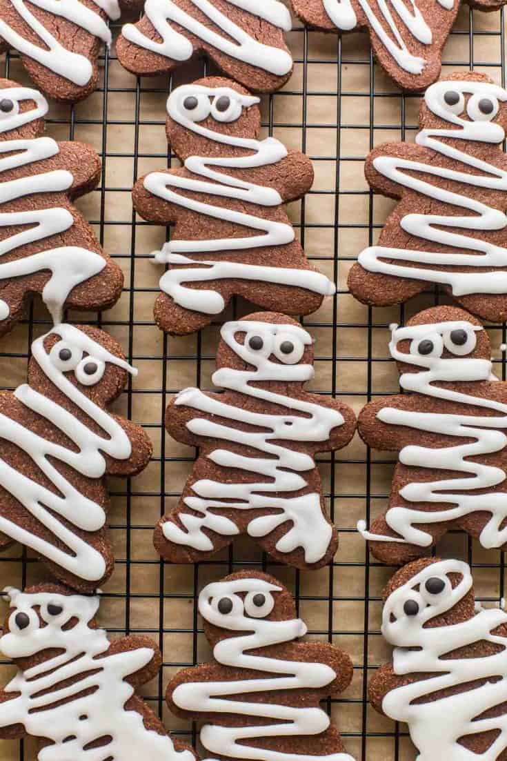 chocolate sugar cookies decorated like mummy gingerbread men