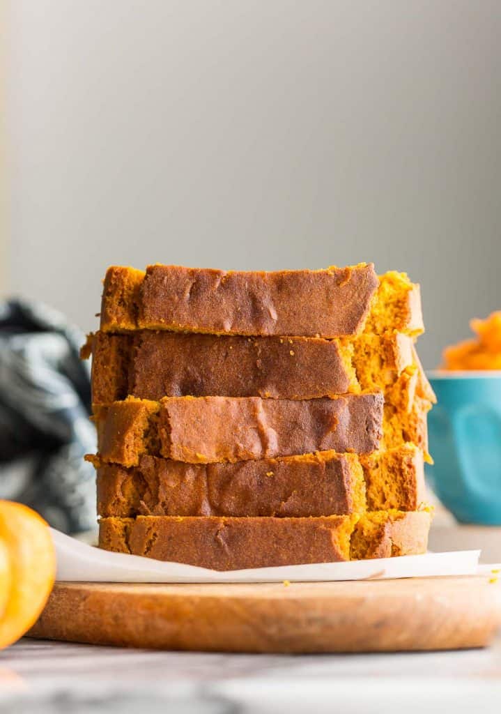 five slices of gluten free pumpkin bread stacked on top of each other