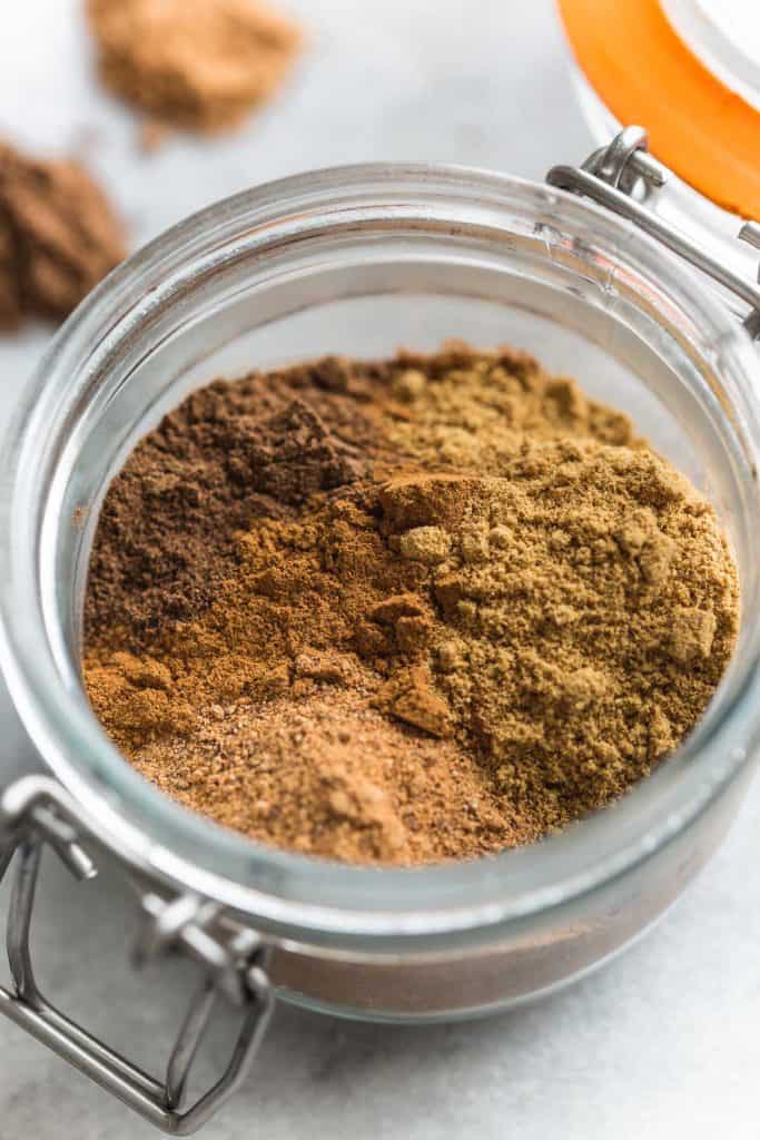 apple pie spices combined in a small jar 