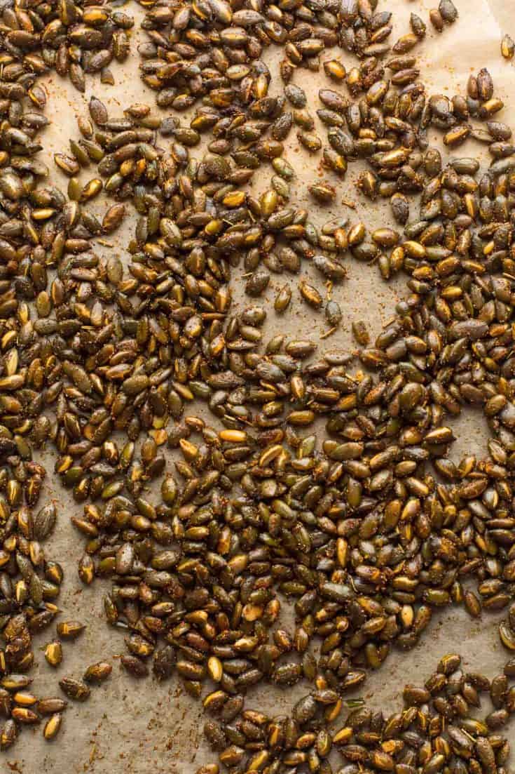 roasted pepitas on a baking sheet