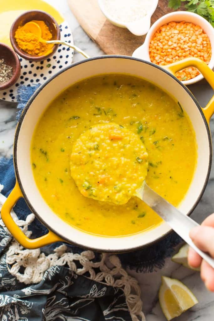 Arabic Lentil Soup in a big soup pot with a serving spoon