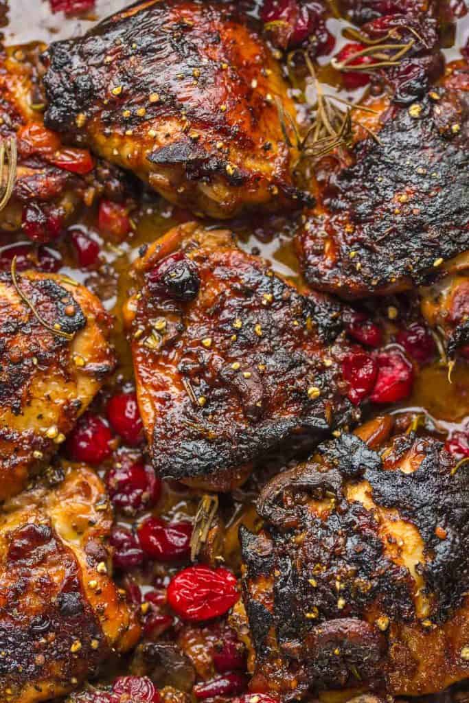 Cranberry Chicken Thighs  topped with mushrooms and pepper