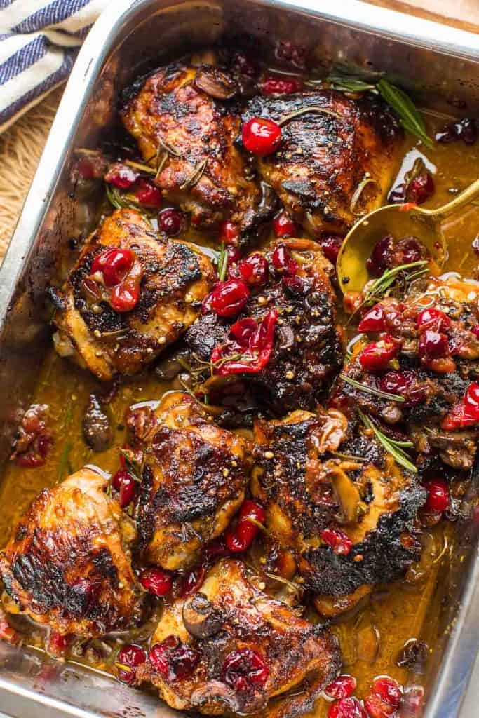 Cranberry Chicken Thighs in a roasting pan