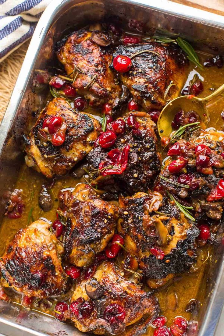 Cranberry Chicken Thighs in a roasting pan