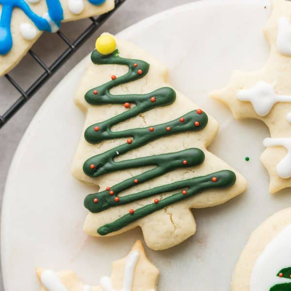 gluten free sugar cookies in the shape of christmas tree decorate with icing