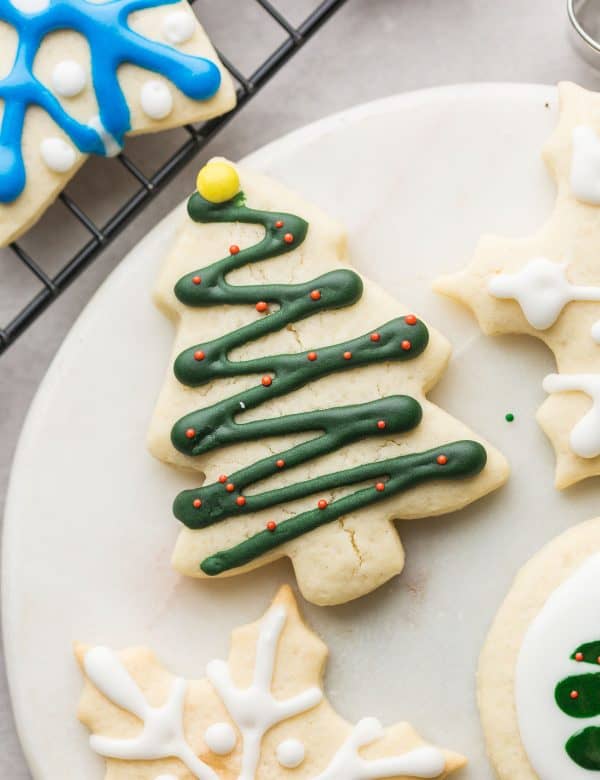 gluten free sugar cookies in the shape of christmas tree decorate with icing