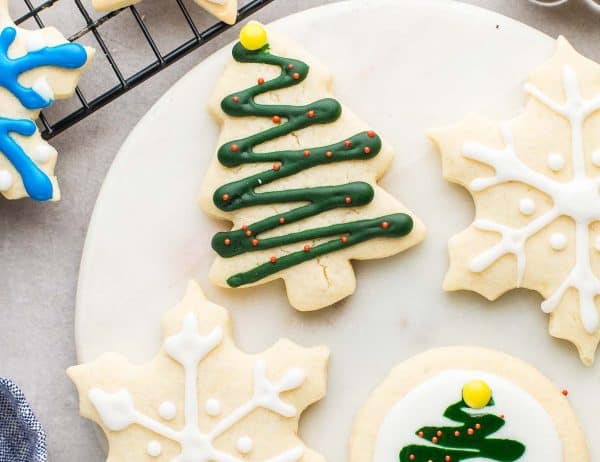 Christmas themed sugar cookies decorated with royal icing