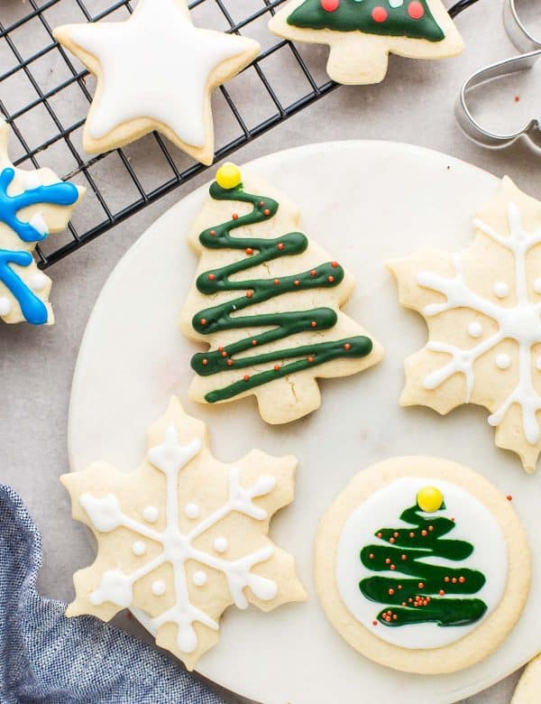 Christmas themed sugar cookies decorated with royal icing