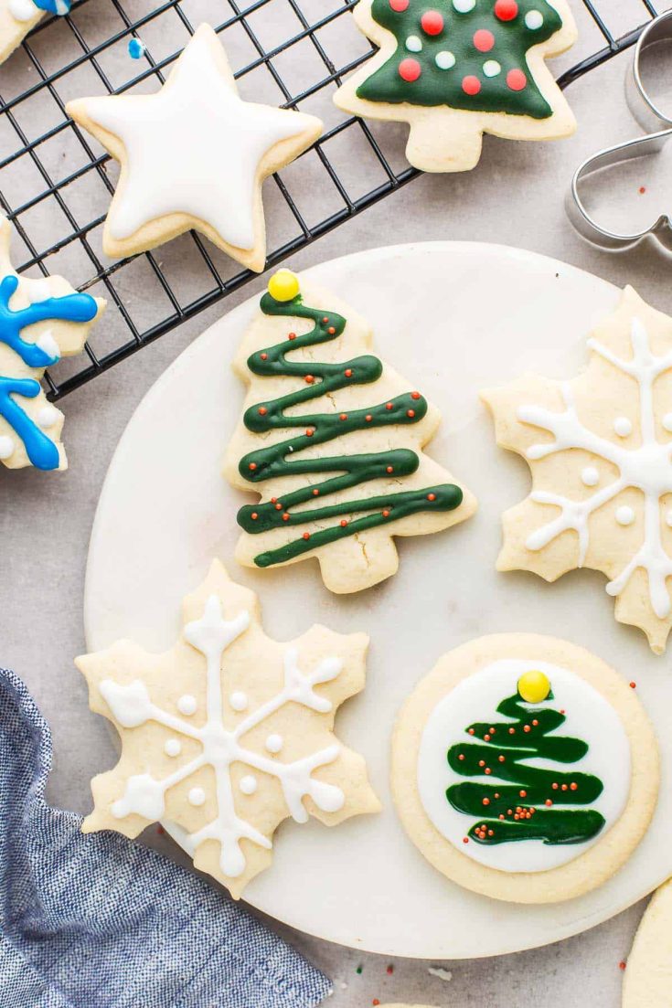Christmas themed sugar cookies decorated with royal icing