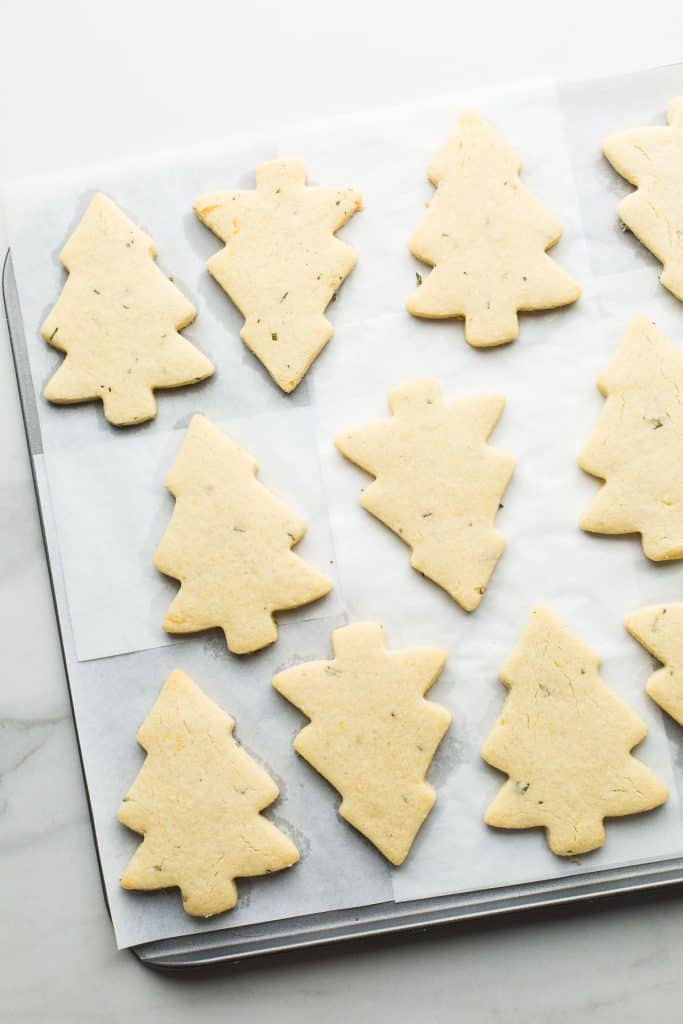 Rosemary Lemon Christmas Tree Cookies on a baking sheet