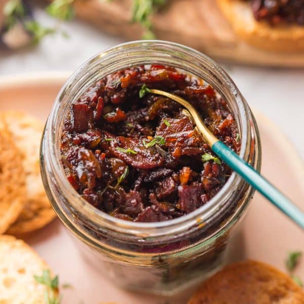 bacon jam in a jar with a spoon