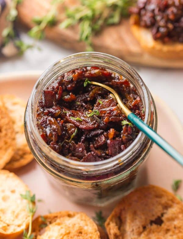 bacon jam in a jar with a spoon