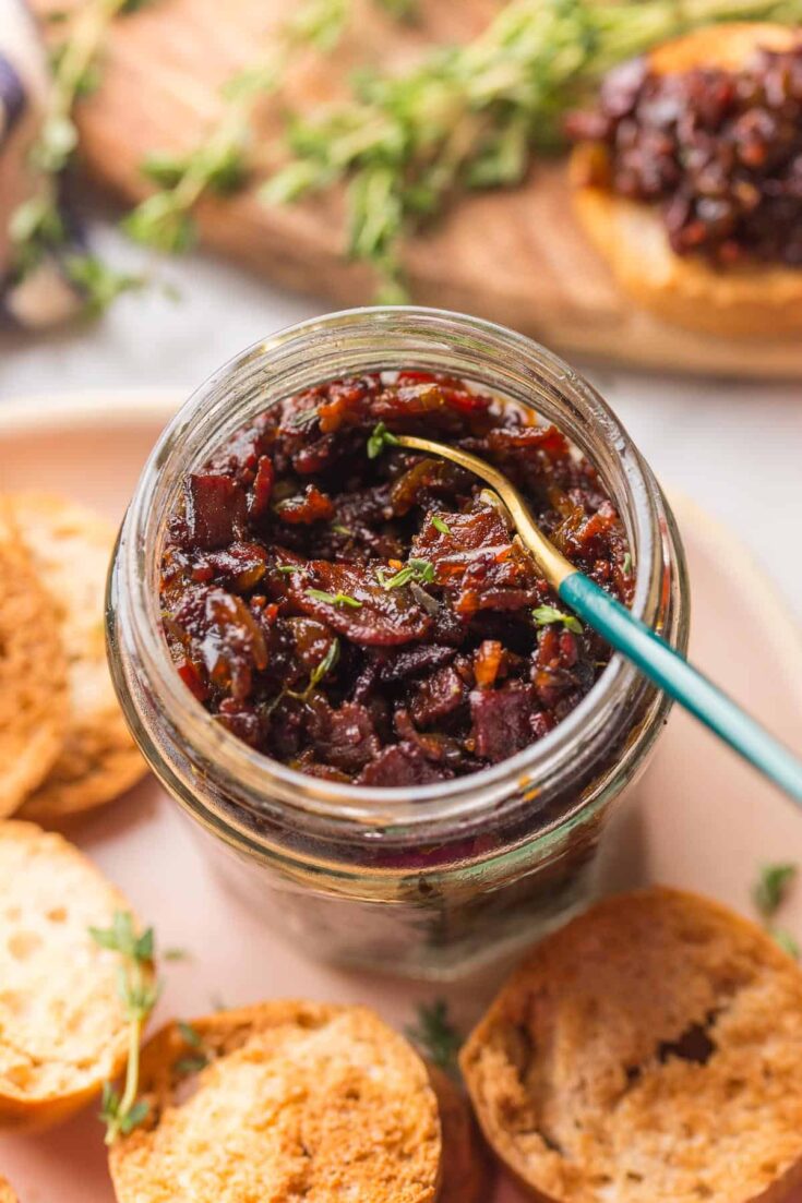 bacon jam in a jar with a spoon