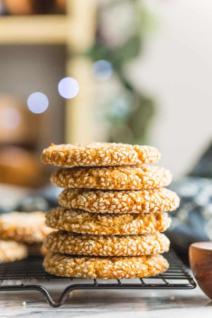 a stack of Tahini Cookies on a cooling rack