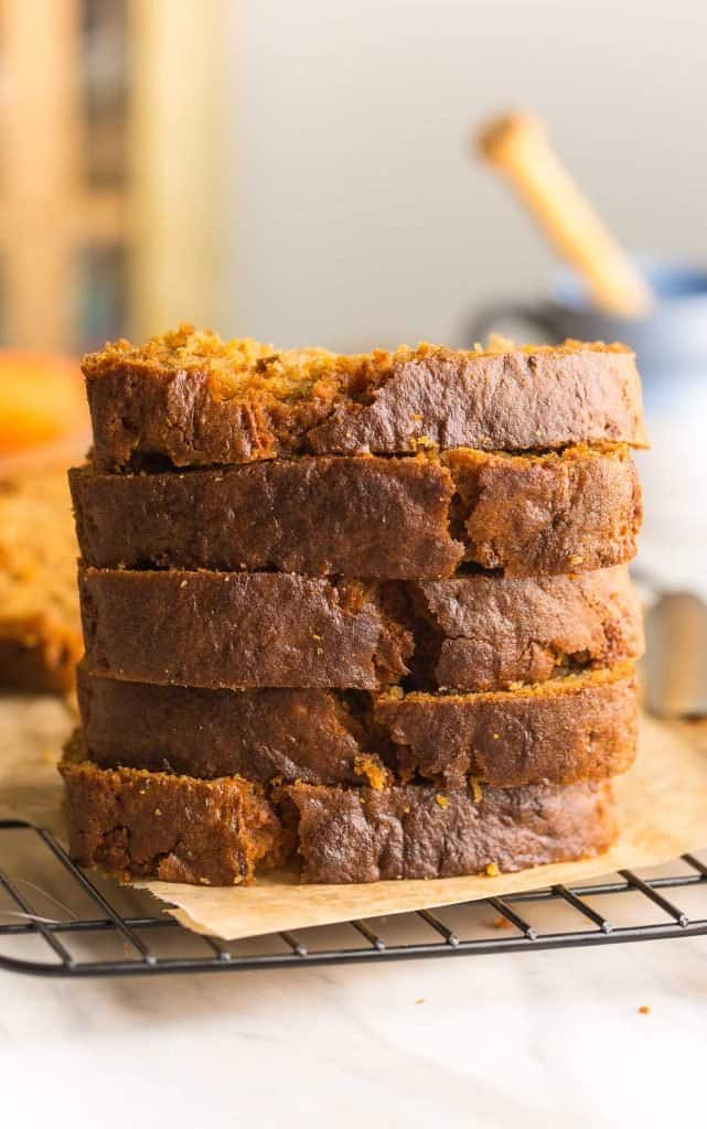 gluten free carrot cake slices stacked on top of each other