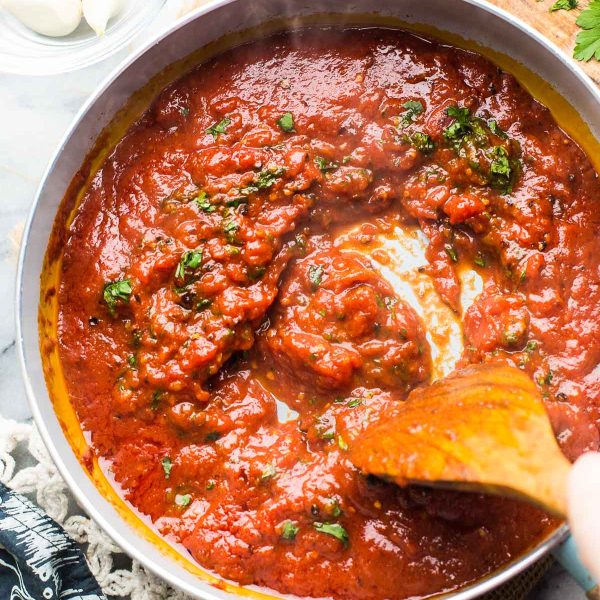 Arrabbiata Sauce stirred in a pan