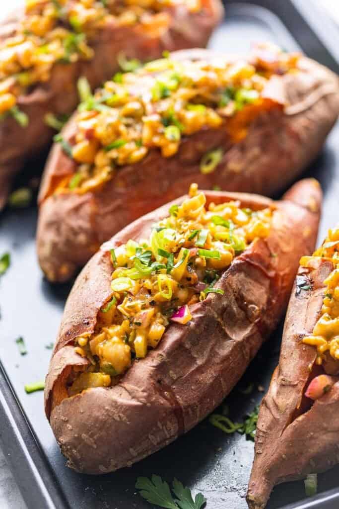 Stuffed sweet potatoes with a smashed chickpea salad 