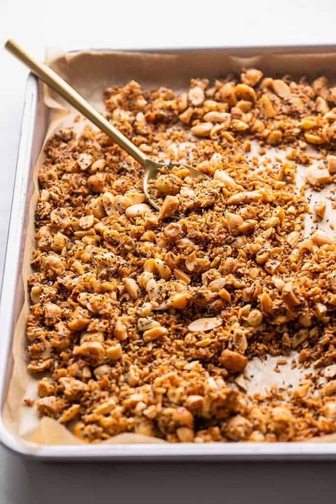 grain free granola on spread out on a baking sheet