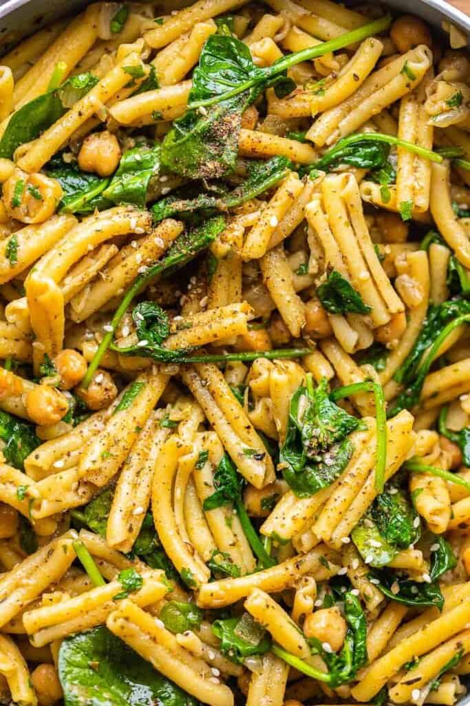 Za'atar Spiced Pasta with Chickpeas up close and sprinkled with za'atar spice