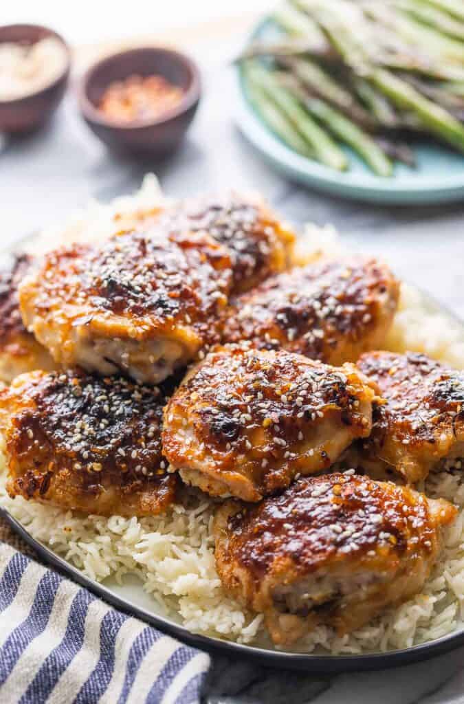 Sticky Miso Chicken Thighs on a platter with rice
