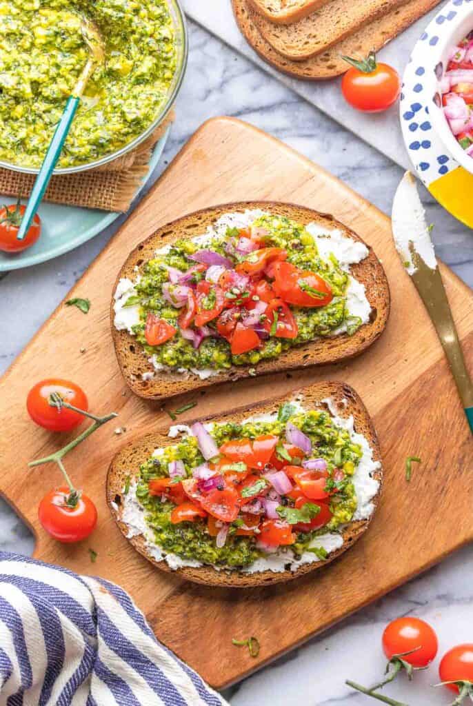 a couple of slices of Cilantro Lime Pesto Toast & Tomato Salsa