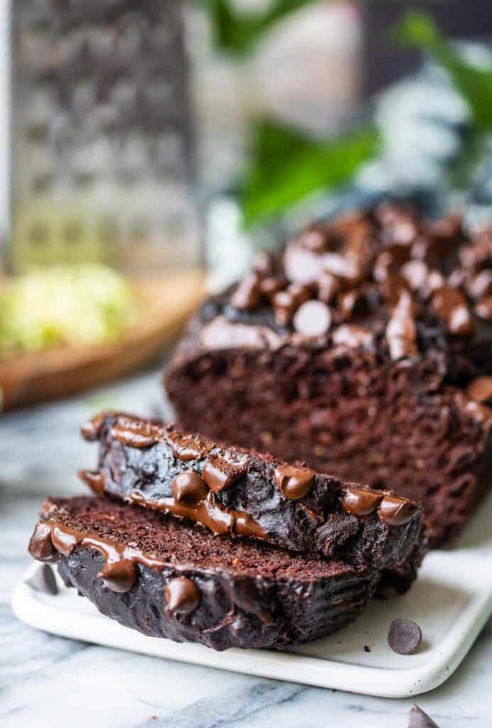 a couple of slices of chocolate zucchini bread cut on a serving platter