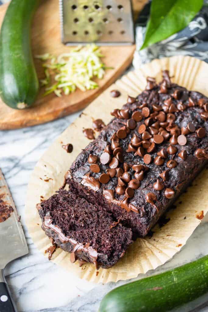 an egg free/vegan version of the chocolate zucchini bread recipe with a slice cut out