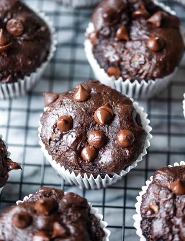 chocolate zucchini muffins cooling on a wire rack