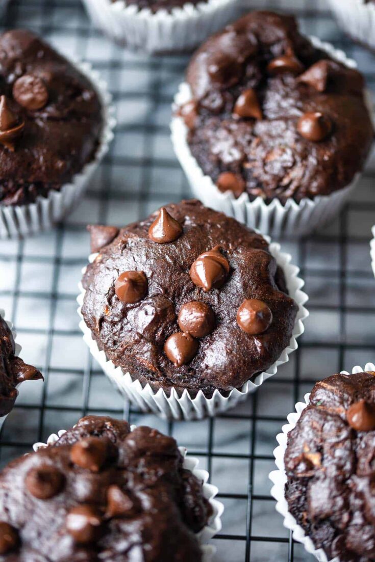 chocolate zucchini muffins cooling on a wire rack