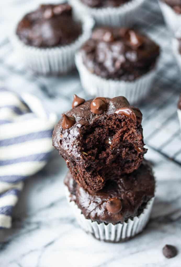 two Gluten Free Chocolate Zucchini Muffins stacked