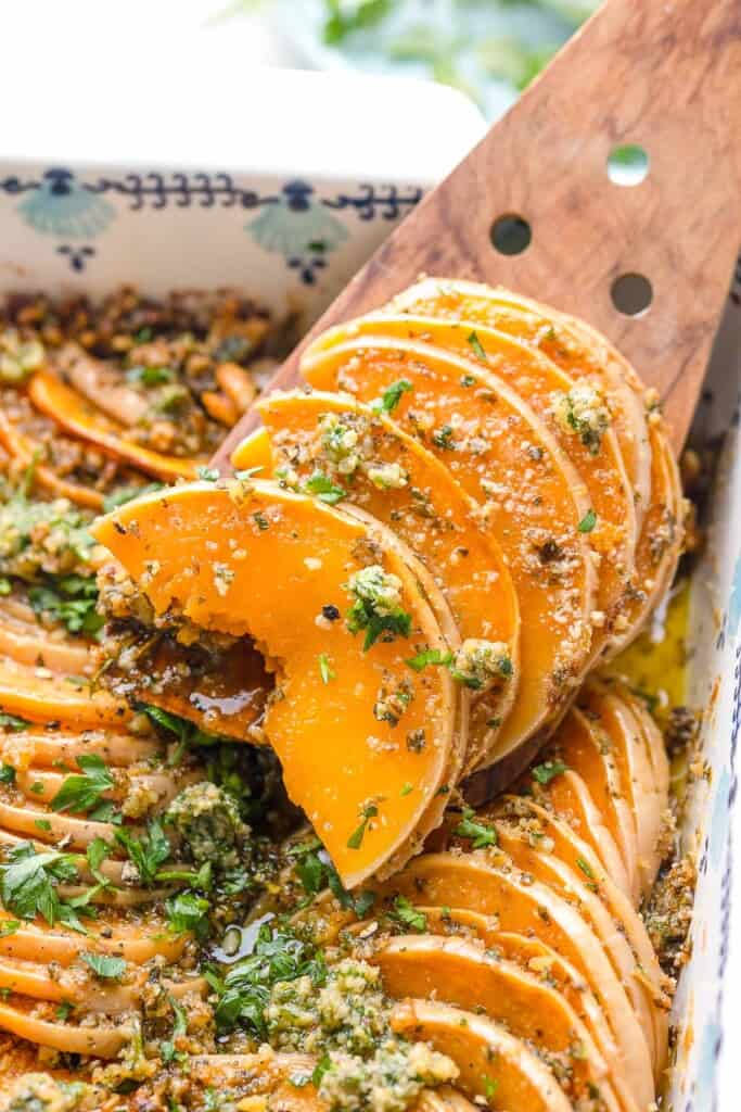 a helping of roasted butternut squash rounds in pesto-6