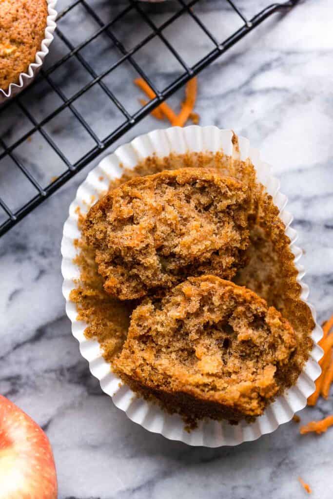 one Carrot & Apple Flaxseed Muffins cut in half