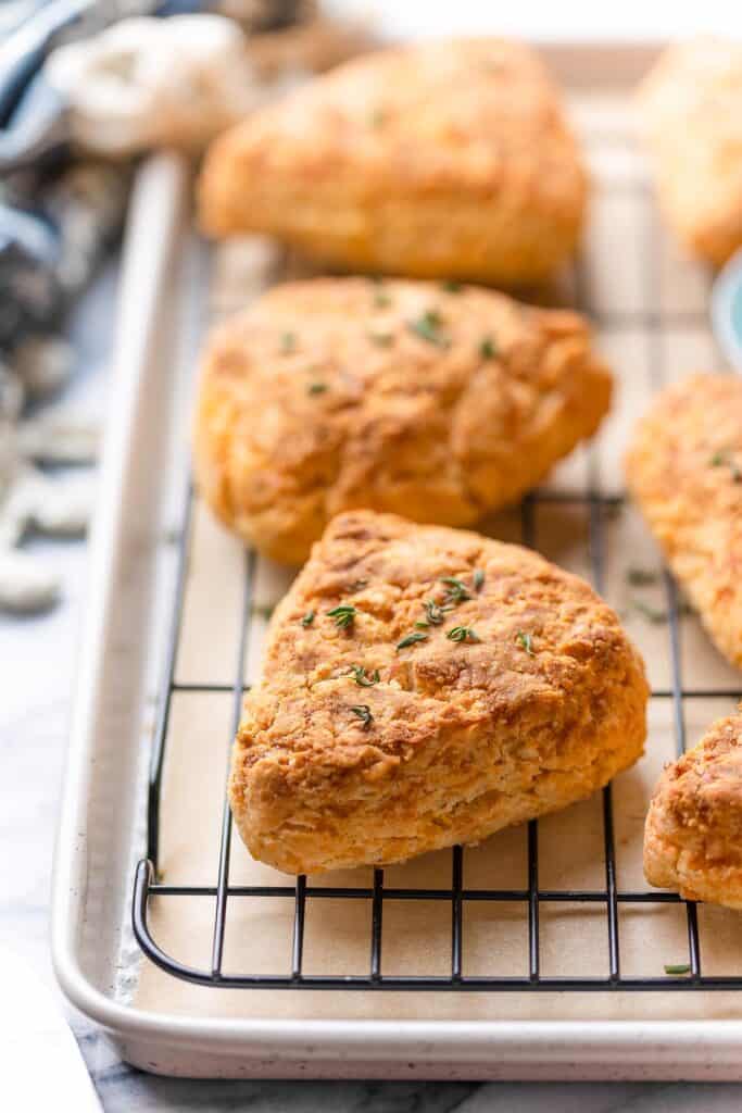 gluten free cheese scones cooling on a wire rack