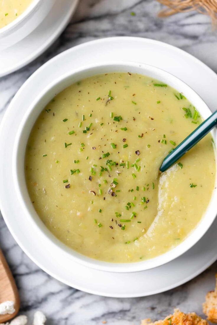 Leek and Potato Soup in a bowl topped with chopped chives