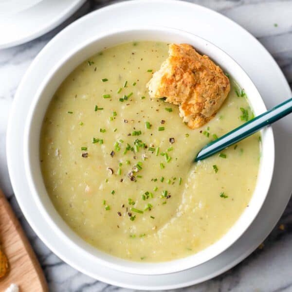 potato leek soup with a bread roll inside