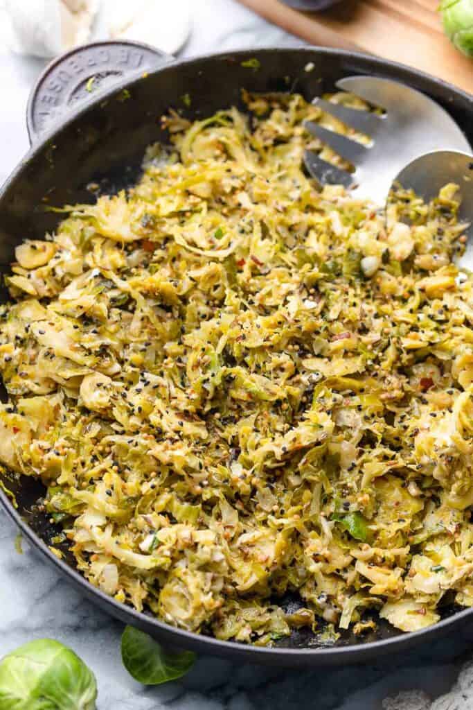 Sautéed Brussels Sprouts in a cast iron skillet