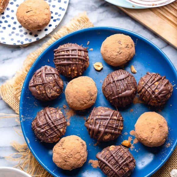 Chocolatey Hazelnut Date Balls on a plate